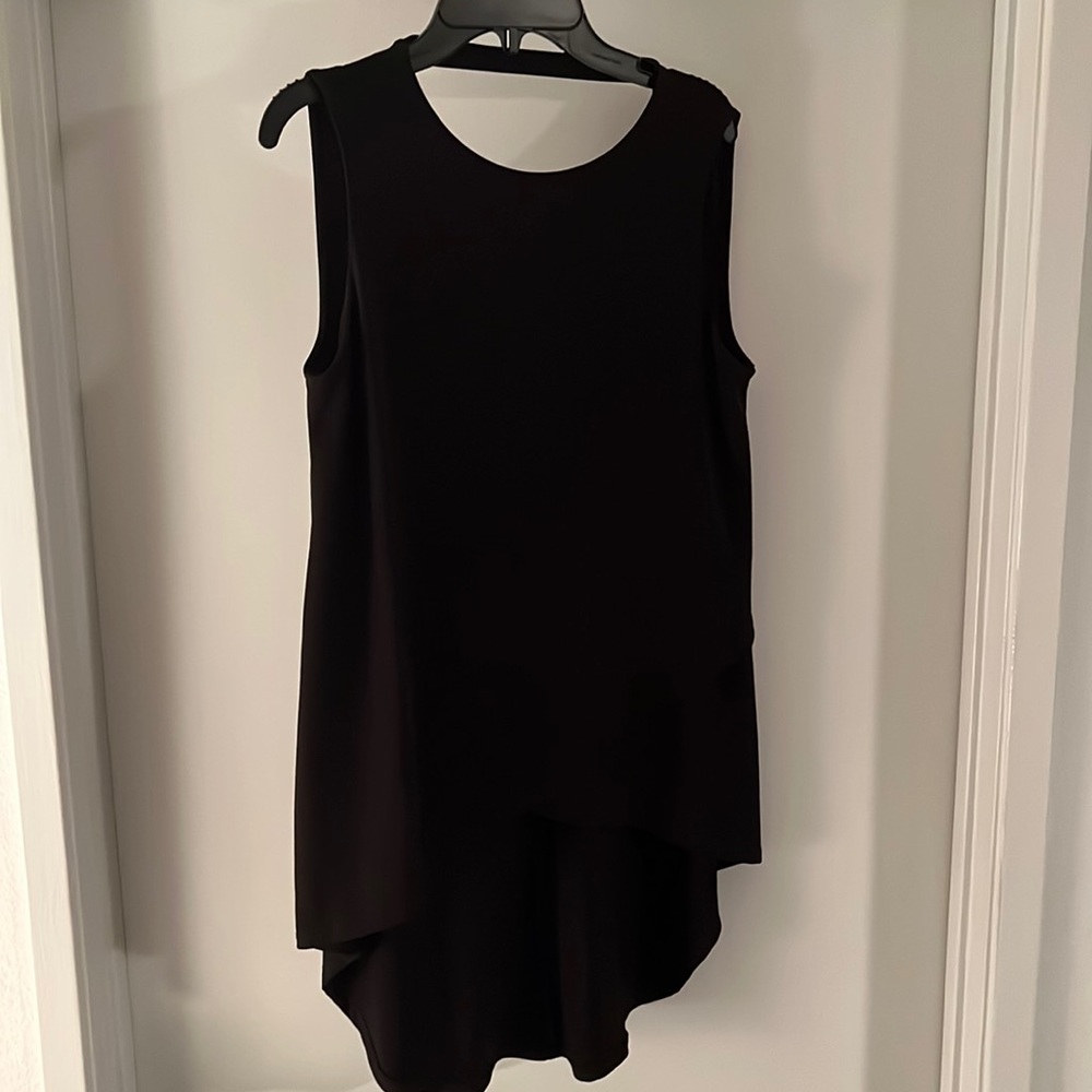 Simple black tunic great for the office and everyday wear!